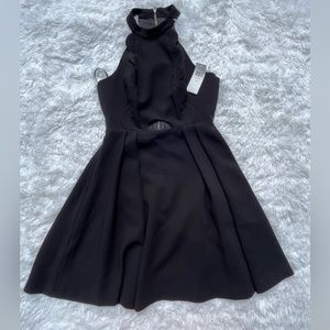 BCBGENERATION BLACK SLEEVELESS DRESS. SIZE 2
